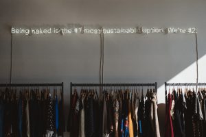clothes hanging in boutique