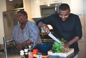 couple preparing vegetarian meal