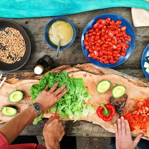 people preparing vegetarian meal