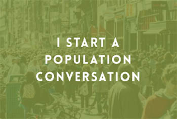 crowd of people in street with green overlay and white text "I start a population conversation