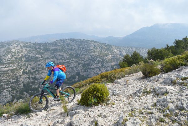 man biking in Calanques National Park, France